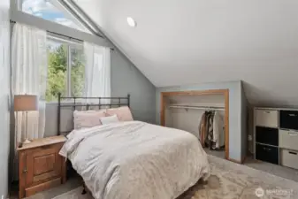 Second bedroom located within the second wing of the home.