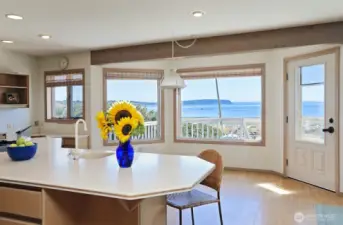 Open concept living space with expansive deck for entertaining.
