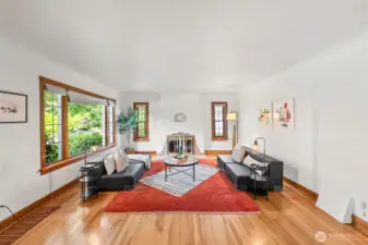 Charming fireplace and updated windows that give off the leaded-glass vibe!