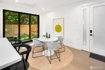 Slider opens up to the fully-fenced private backyard area with patio.