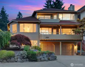 Great curb appeal, attached 2-car oversized garage with super long driveway (great for RV or boat!), and also extra parking in front of retaining wall.