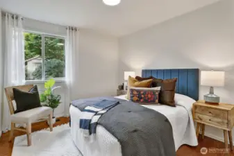 Bedroom #2 on main floor w/backyard views.