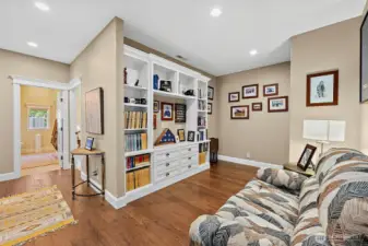 Library/Den/Media or play room just off living room