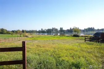 The fenced land has enough room for livestock.  The lot extends to the middle of the lake.