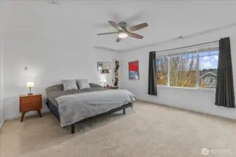 Huge Primary bedroom with an attached 5-piece bathroom and TWO walk-in closets!