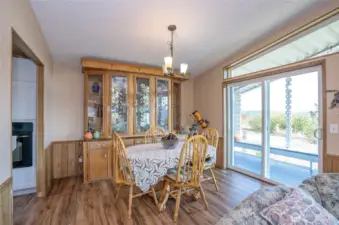Refined dining area designed to capture the surrounding beauty.