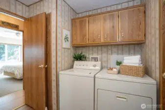 Cozy vintage laundry room with natural light.