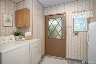 Another laundry room view out to the great outdoors.