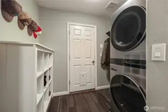 Laundry/mudroom area just inside door to garage (BTW, a new door has been order and will be installed prior to closing!!)