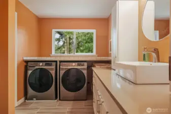 Extra bonus!!  Primary bath is equipped with a washer and dryer!  (The other laundry area is on the main level!!)