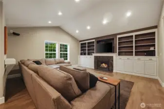 Huge upper level recreational/media room, with its own gas log fireplace!!