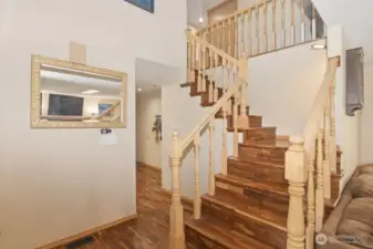 Hand-scraped acacia wood floors.