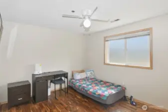 4th bedroom with ceiling fan.