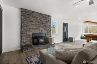 Relax next to your pellet stove in this large family room off the kitchen.