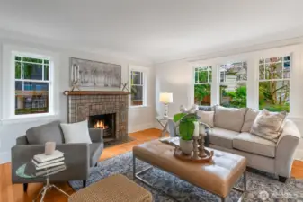 Gather around the Batchelder framed fire place