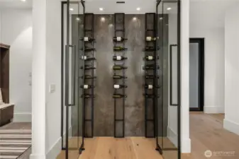 Main level enclosed wine wall