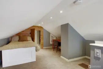 A finished closet and a very large unfinished storage area are just beyond that door. See virtual tour dollhouse for photos.
