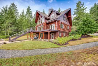East-side view of stunning 4 BR home.