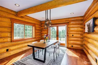 Cozy dining room with French doors to deck.