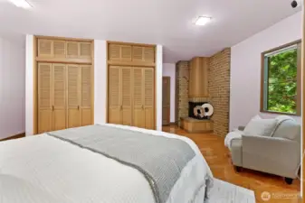 Warmth and character define this retreat, featuring a wood-burning fireplace and dual closets that combine charm with functionality.