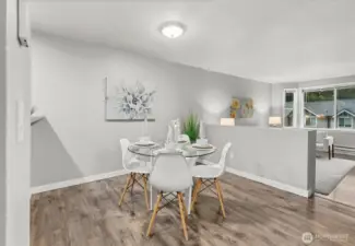 Designed for both comfort & connection, the dining space seats six with ease — a welcoming spot for casual weekday meals or memorable holiday entertaining.