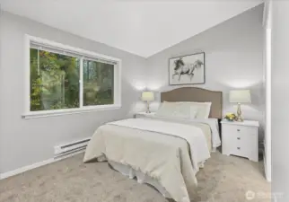 Vaulted ceilings elevate the sense of space and light in your primary suite, creating an airy & inviting retreat.