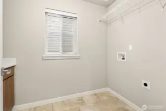 Laundry room located upstairs for convenience.