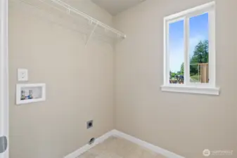 Laundry room located upstairs for convenience.