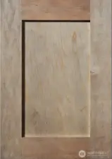 Shadow- stained Shaker-style Maple wood cabinets throughout