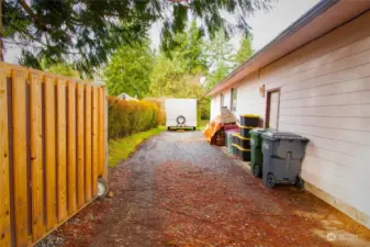 Roll away gate for easy access to RV parking and or backyard
