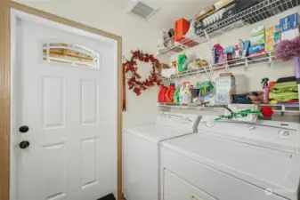 Laundry room with access to the incredible yard.