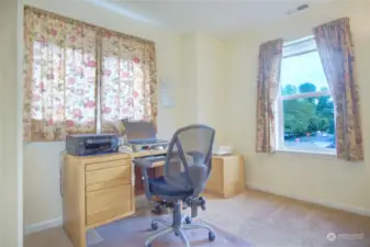 Second bedroom at the front of the house, presently used as an office. Notice two windows for light.