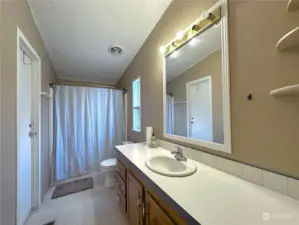 Full Bathroom with large soaking tub