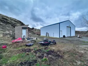 Outbuildings with fence enclosures