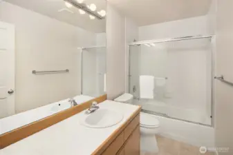 Full bathroom outside second bedroom.