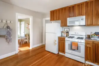 The kitchen with Fir Floors and handsome real wood cabinets is a chef’s dream.
