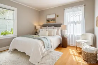The main bedroom on the south side of the home is a bit larger and was just repainted this dreamy color.