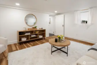 You’ll love the crisp finishes, new flooring and natural light in this downstairs bedroom or Family room.