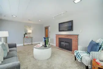 Lower level living room with gas fireplace