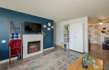 Newer electric fireplace and laminate flooring through out common areas.