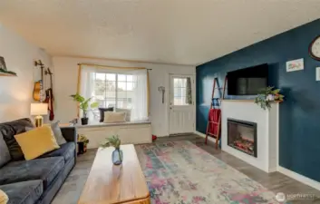 A cozy sitting nook by the front window