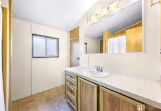 Full Bathroom with access to Primary Bedroom