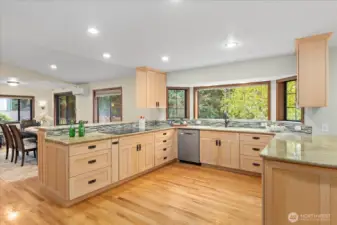 Welcome to your kitchen where inspiration meets innovation with double ovens, elevating every meal into a masterpiece. A discreet downdraft vent system enhances the kitchen’s clean aesthetic while maintaining open sightlines.