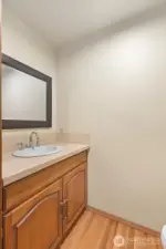 Right off your laundry room is a half guest bathroom.