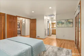 Add a stylish barn door for added privacy between the primary suite and ensuite bath