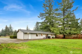 In a quiet but central part of Ferndale, this home has a HUGE flat backyard