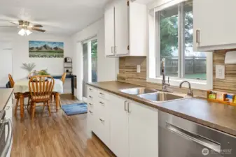 The eat-in kitchen overlooks the backyard and has lots of room for a table and sliders to the backyard