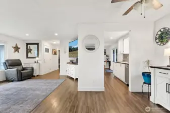 View of living room and kitchen from the dining room