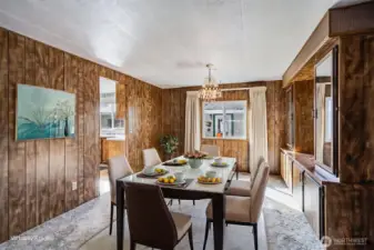 The dining room shown with virtual staging.