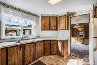 The kitchen has great access to the formal dining room.